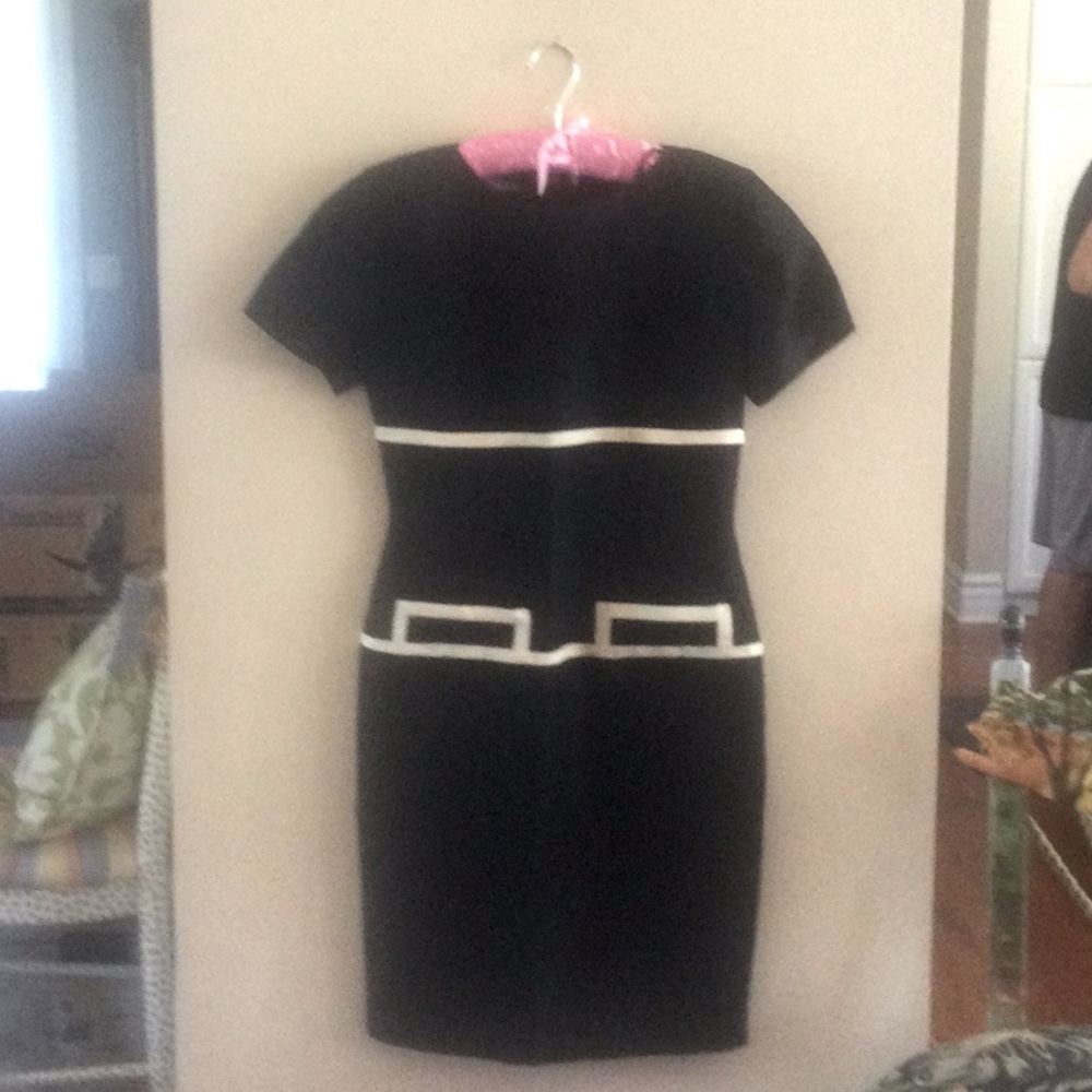 Sexy business dress Gillian never worn  size 2 p